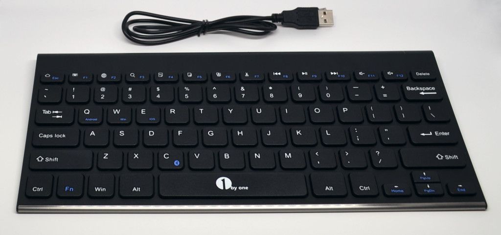 The 1byone Wireless Bluetooth Keyboard and micro-USB charging cable.