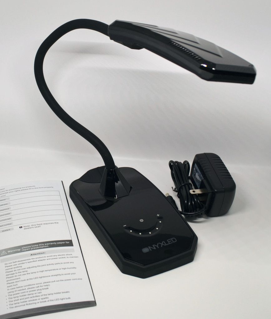 The lamp comes with an instruction manual and AC adapter.