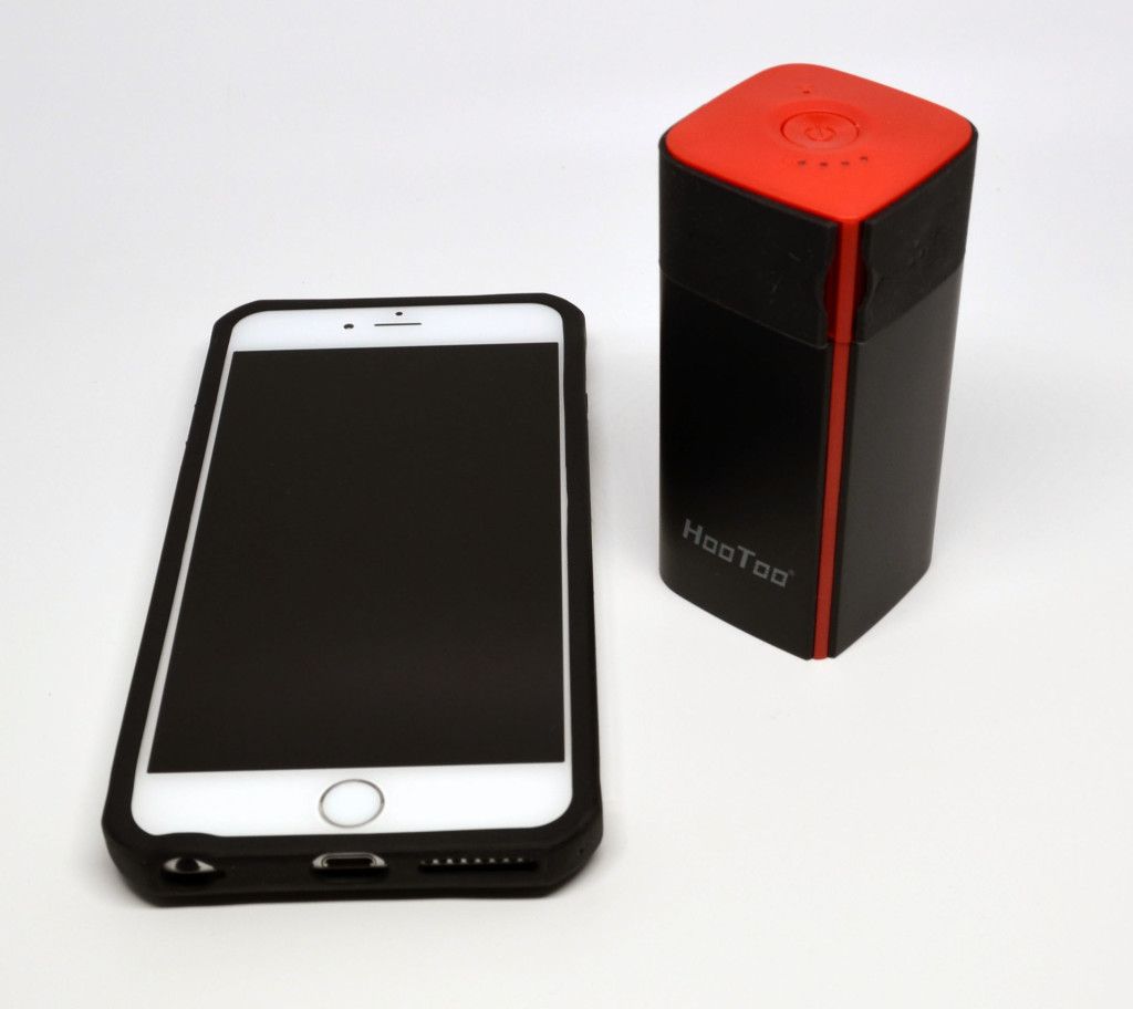A size comparison of the HooToo TripMate Titan versus an Apple iPhone 6 Plus.