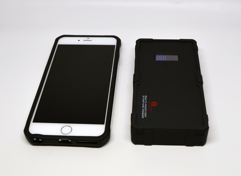 To the right is the main unit, and to the left is an Apple iPhone 6 Plus. As can be seen from the size comparison, it's an incredibly compact unit for all of its features.