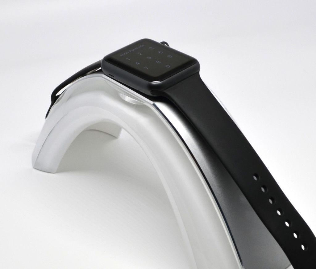 The watch on the stand.