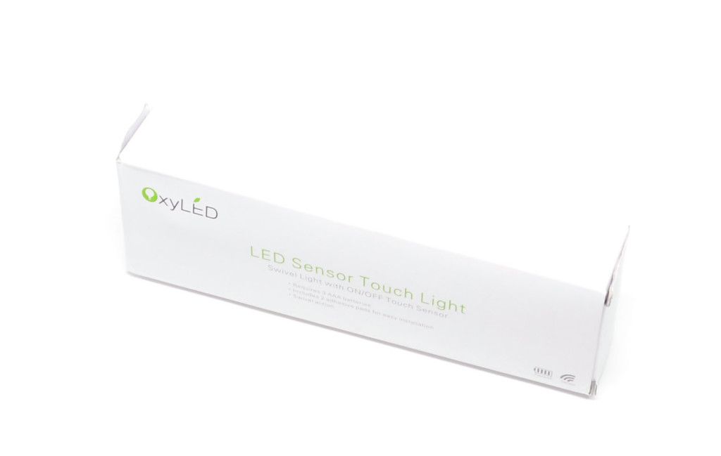 The packaging for the OxyLED T-01 DIY Stick-on Anywhere 4-LED Touch Tap Light.