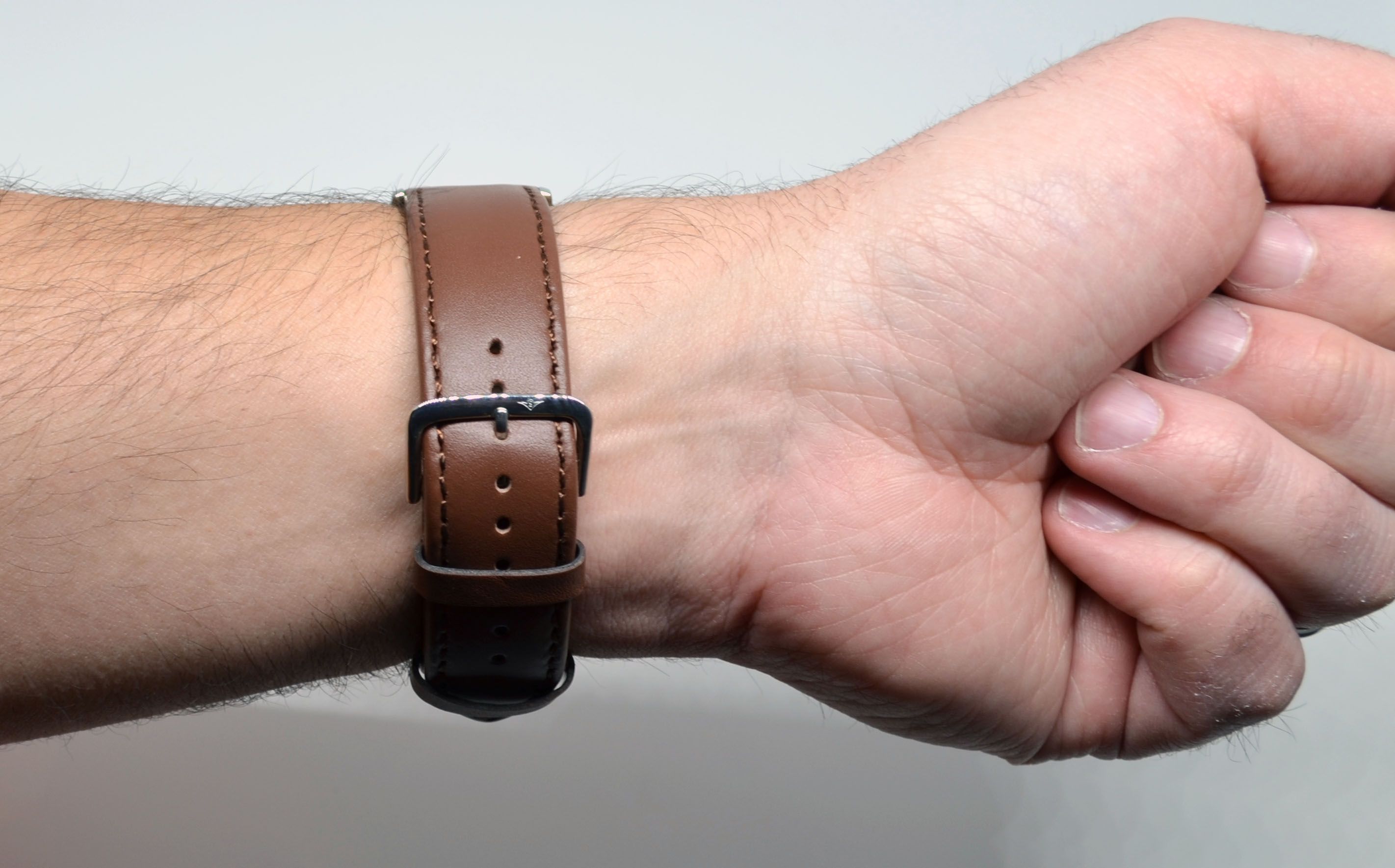 The strap when wearing it.