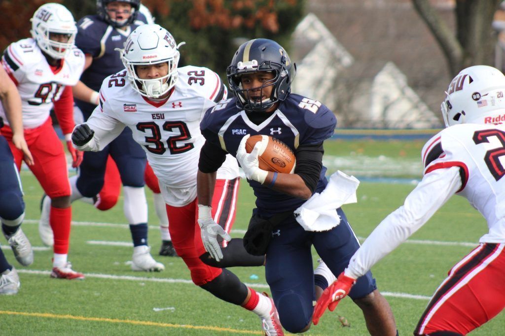 Football players in action.