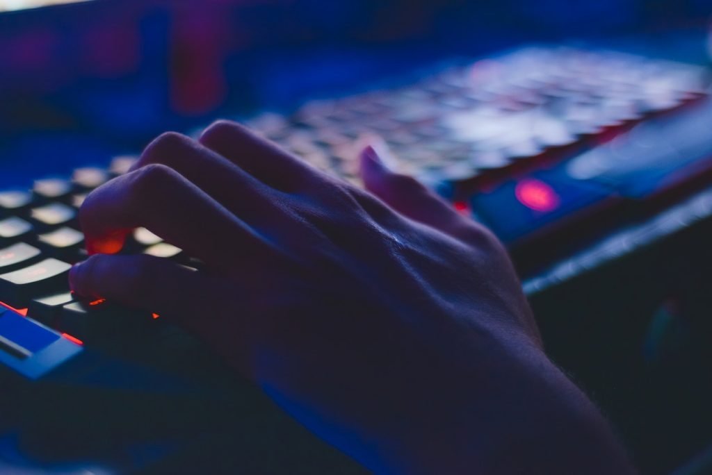 Hand typing on a keyboard