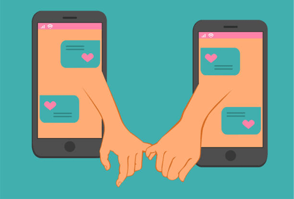 Two phones next to each other with hands holding to connect the two active chats