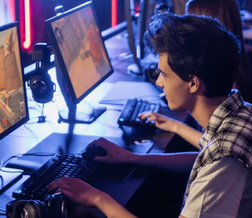 young man playing at a LAN tournament