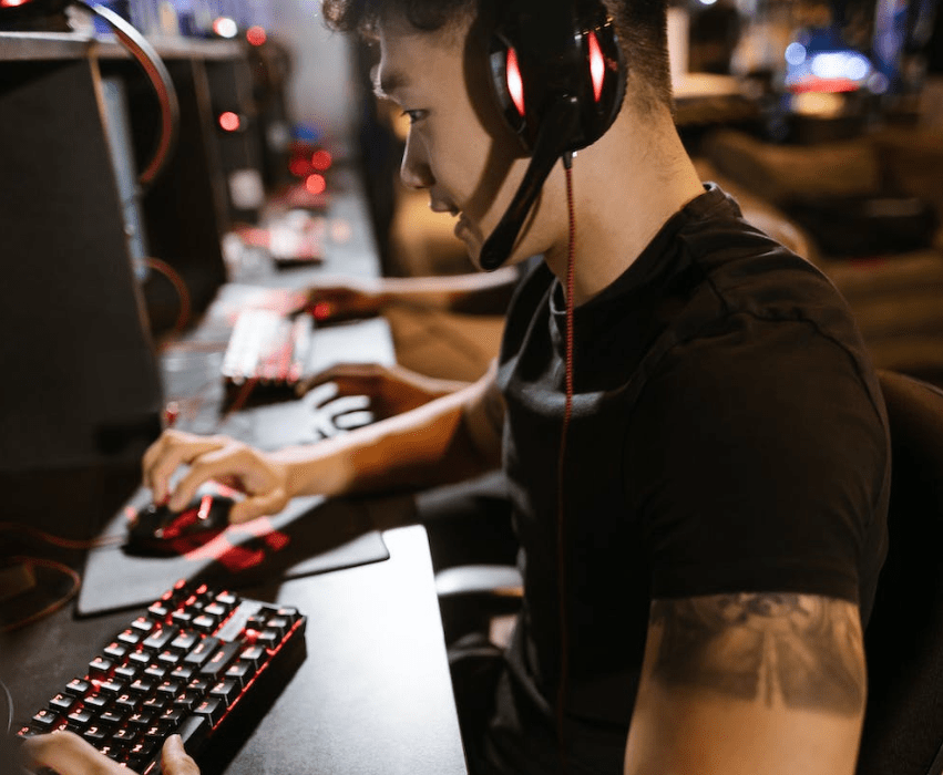 young man playing at a LAN tournament