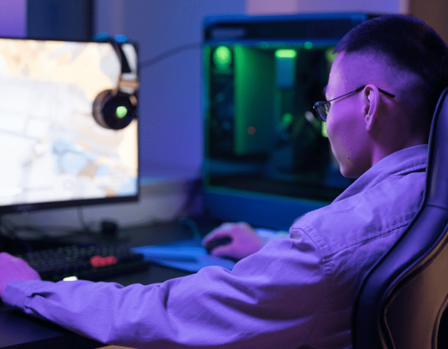 young man playing at a LAN tournament