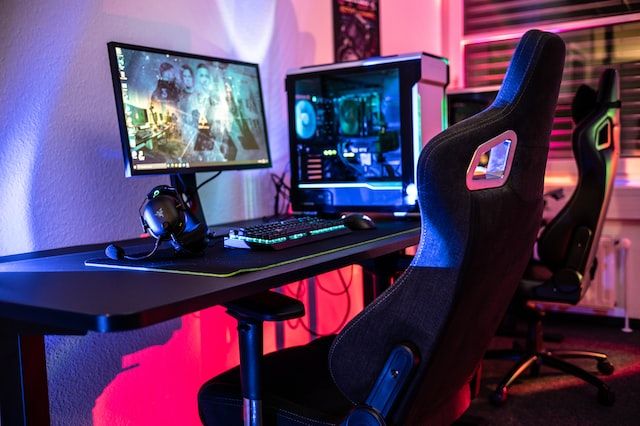 eSports gaming computer monitor, PC, desk, and chair