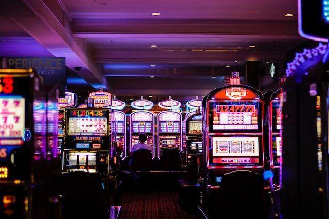 Interior of casino with many slot machines