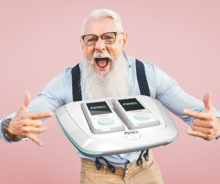 Old man pointing to an Amico console.