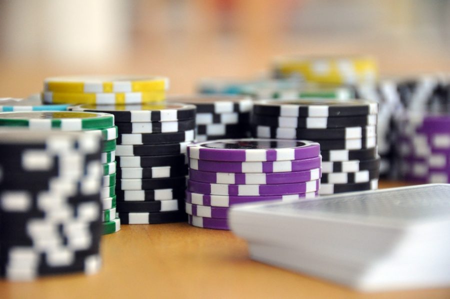 Close up of poker chips and a deck of cards
