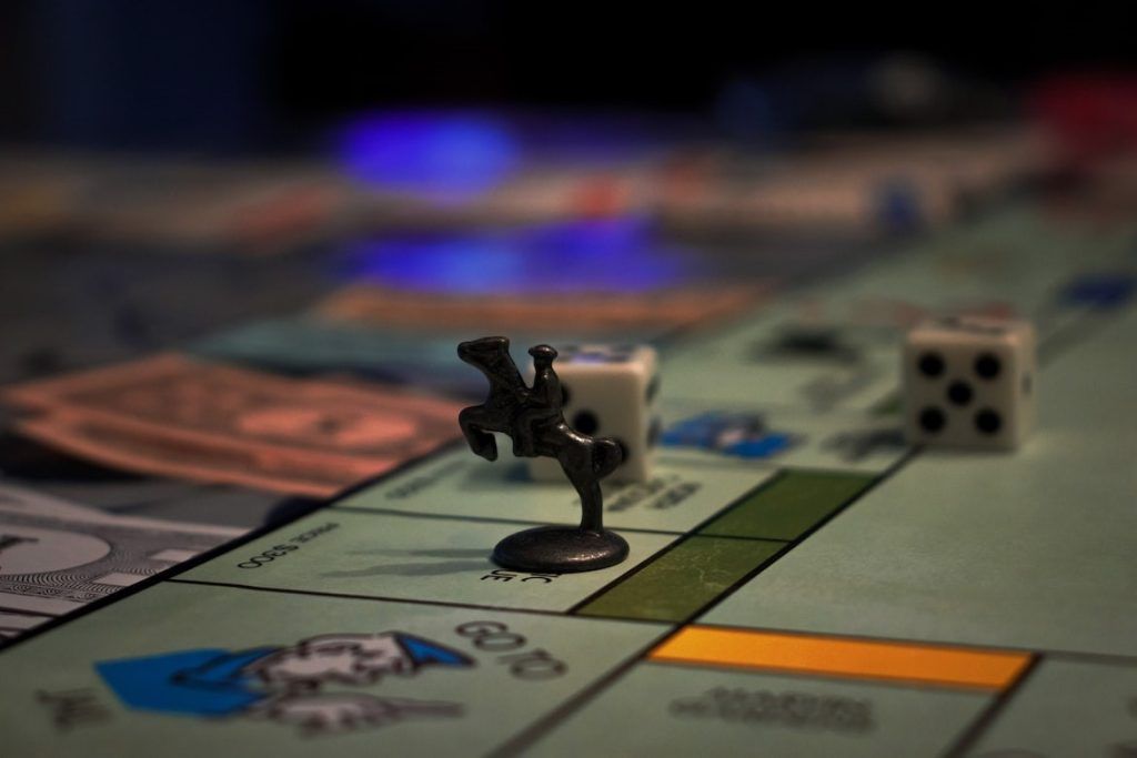 Monopoly board close-up on a playing piece