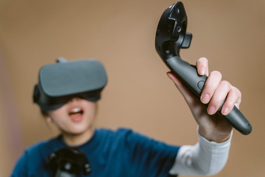 Female gamer playing VR