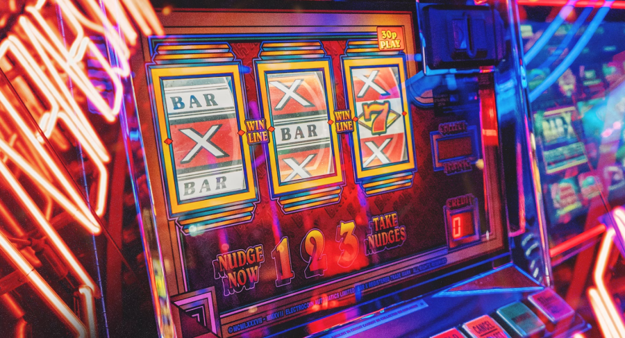 Modified slot machine image from https://unsplash.com/photos/arcade-game-machine-turned-on-in-a-room-aD3_Zf5tfr4