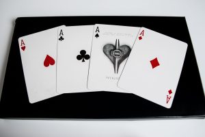 Blackjack playing cards on a black background