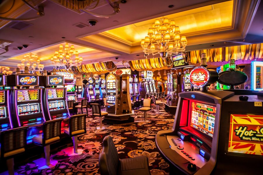 arcade machine with lights turned on inside room - Las Vegas, NV