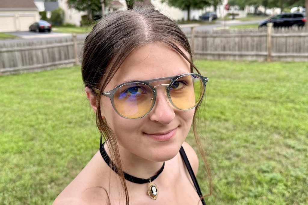Gunnar World of Warcraft, Alliance Edition glasses worn by a young woman outdoors