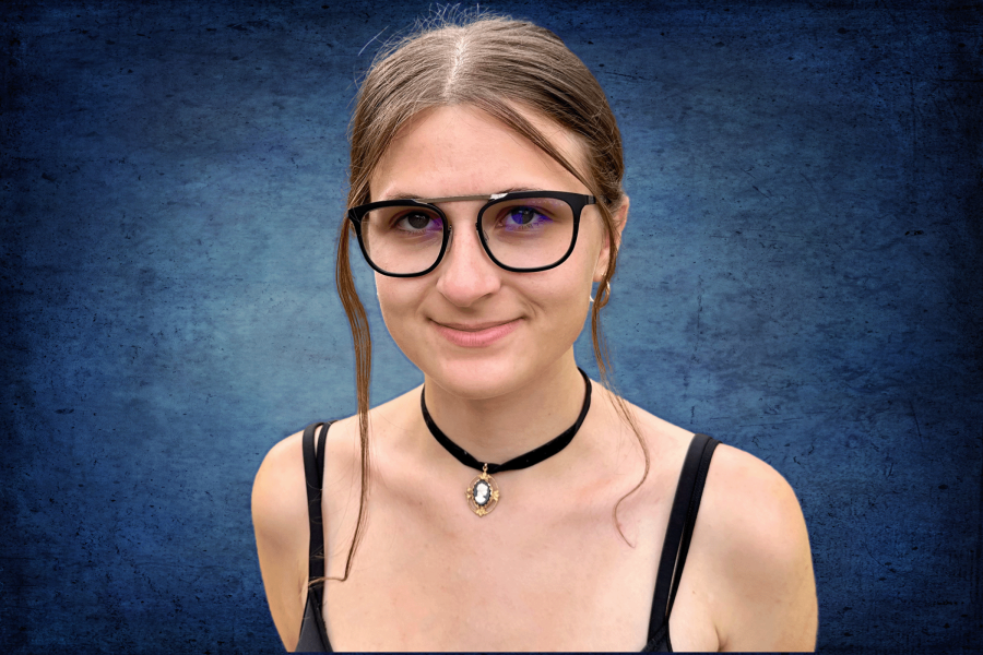 Gunnar Pismo Clear Pro Glasses being worn by a woman against a blue background