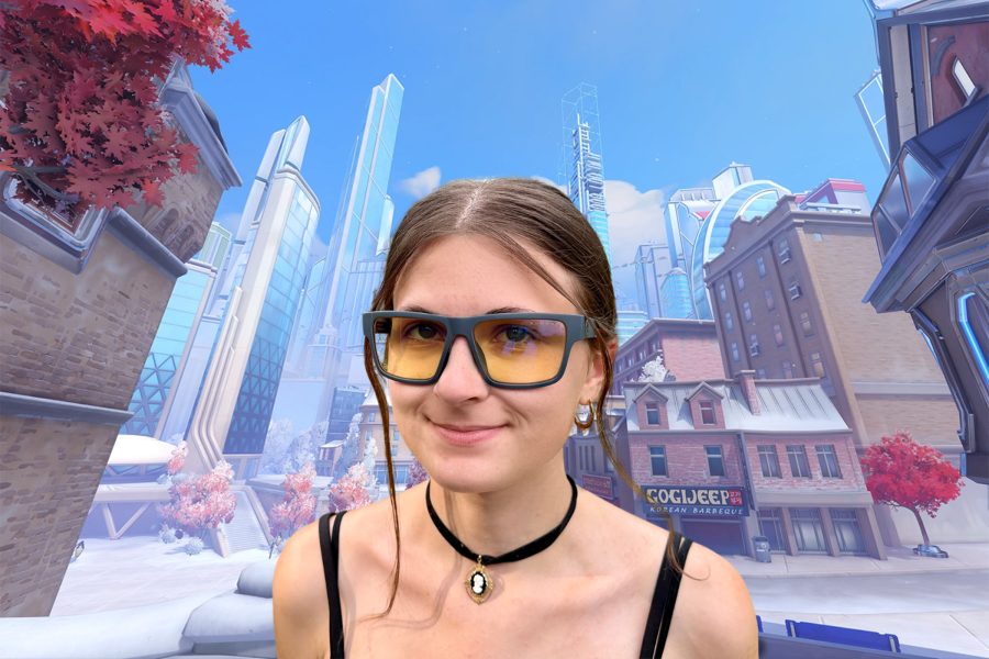 woman wearing Gunnar Overwatch Ultimate Computer Glasses on an Overwatch backdrop