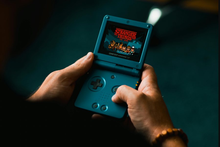 Stranger Things being played on the Nintendo Game Boy Advance SP