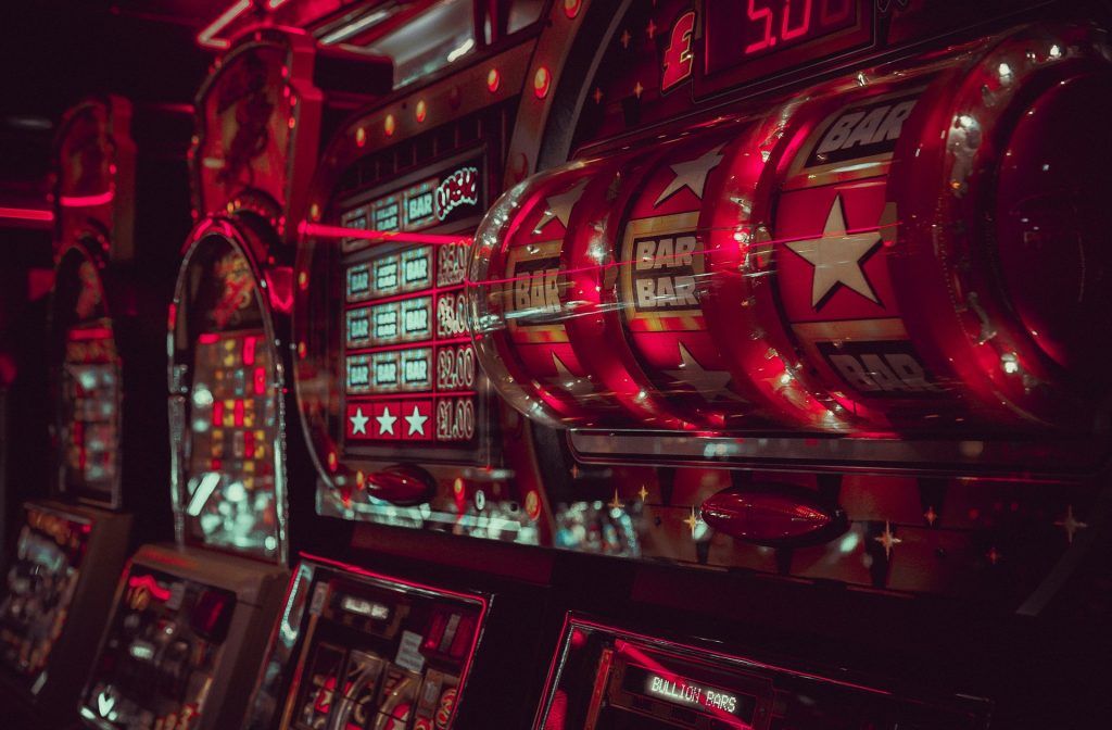 a red-tinged casino arcade