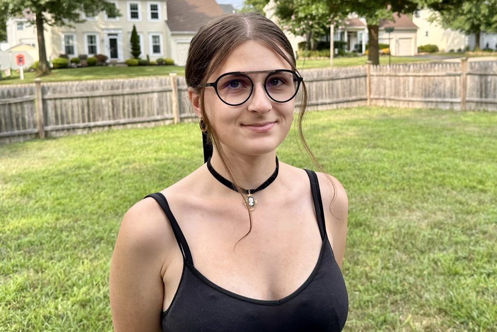 Woman wearing Gunnar Pacifica glasses (Epic, Onyx/Silver, Clear Pro Lens Tint) outdoors.