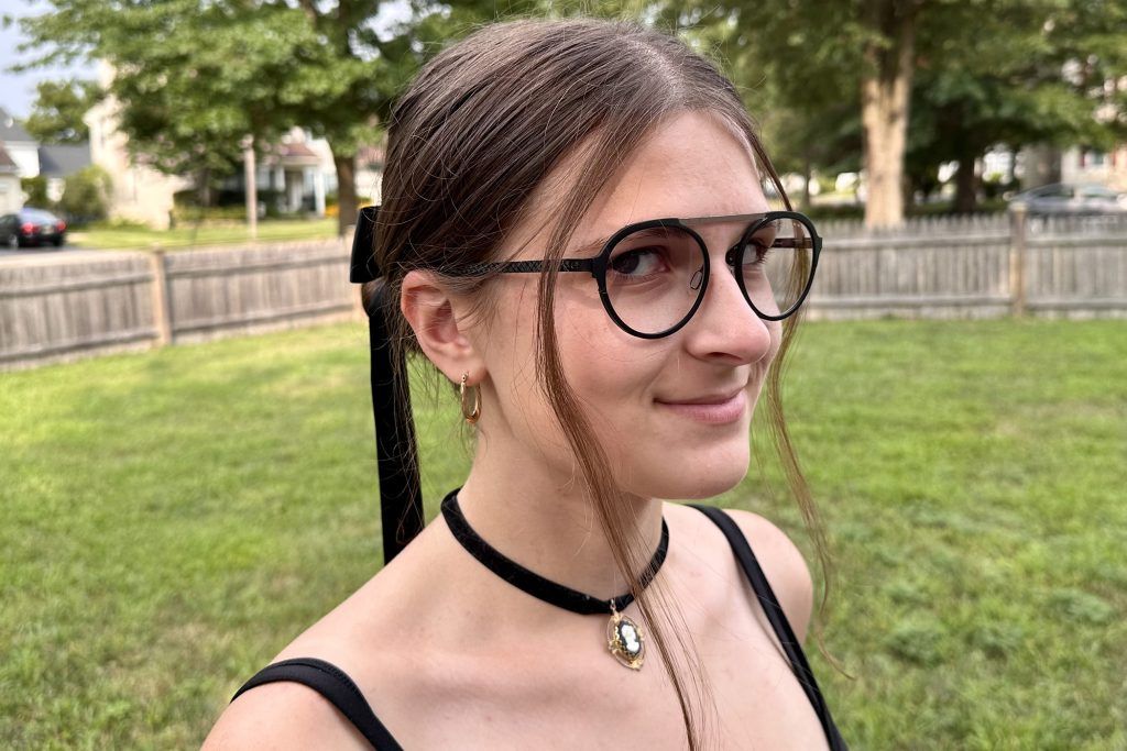 Woman wearing Gunnar Pacifica glasses (Epic, Onyx/Silver, Clear Pro Lens Tint) outdoors.