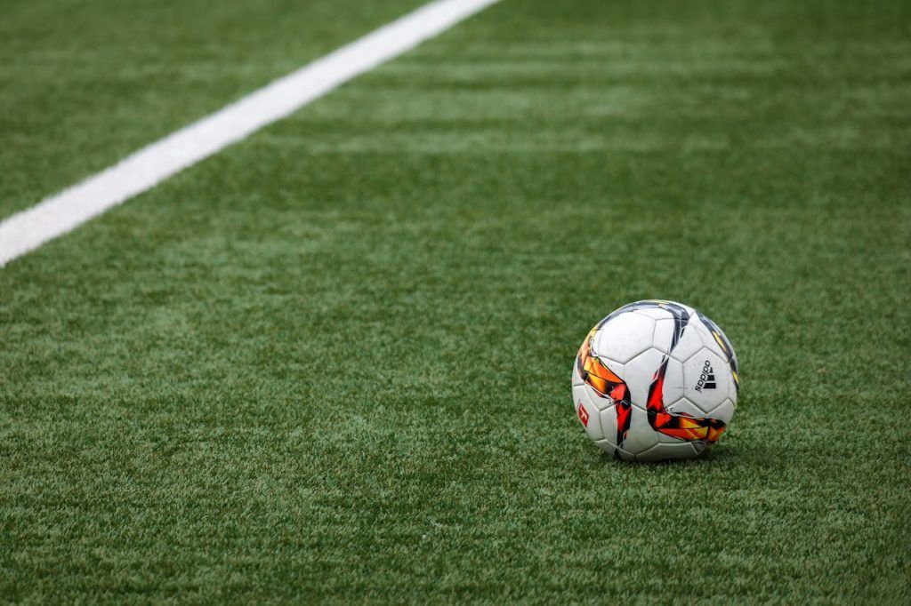 Football / Soccer ball on field