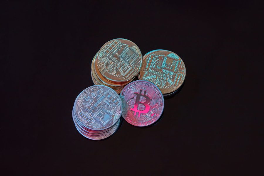 Bitcoins on black surface