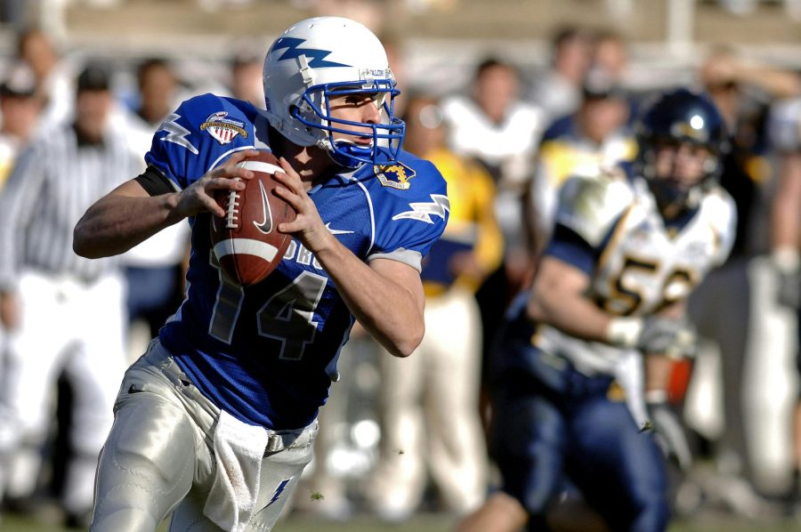 Football quarterback getting ready to throw a pass