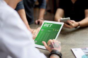 betting on a soccer game on a tablet