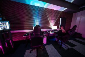 PC gaming setup with a man and woman