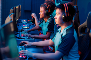 Competitive esports gamers in front of PCs