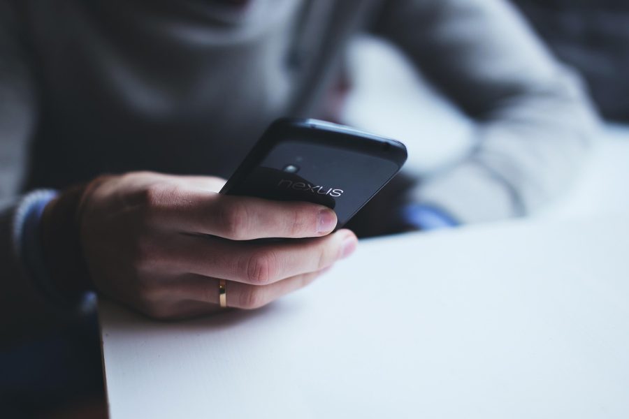 hand holding a smartphone closeup