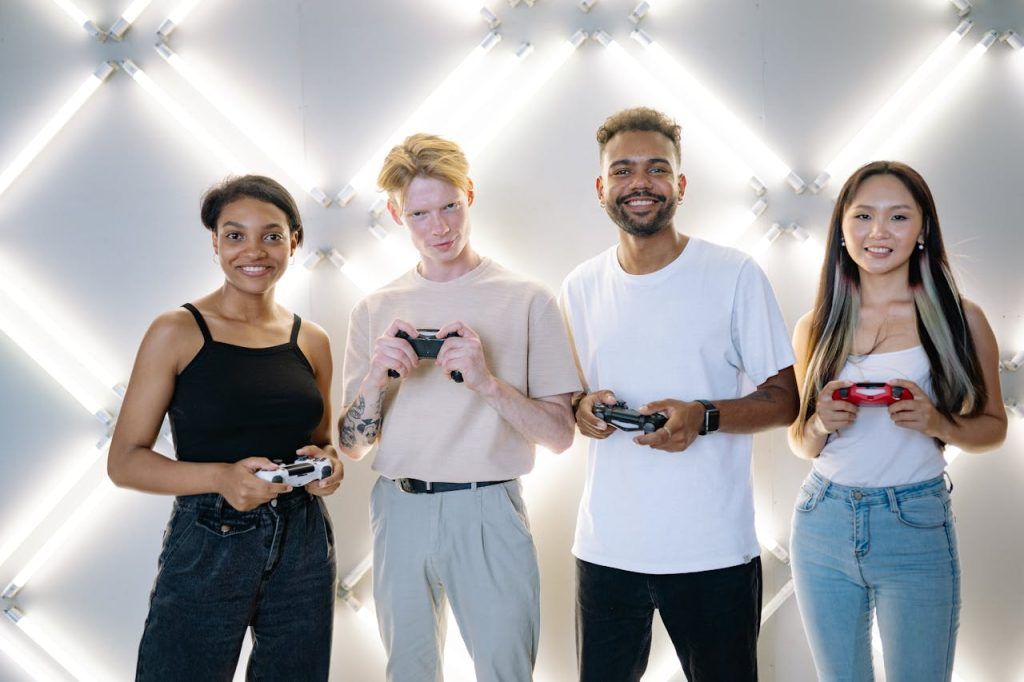 Group of Friends Smiling while Holding Game Controllers