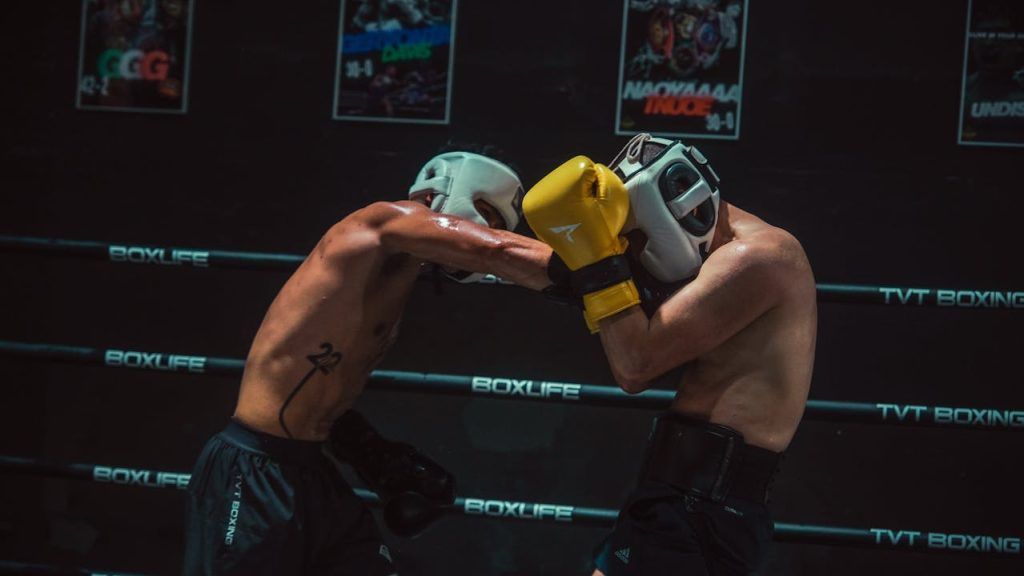 Intense Boxing Match in Training Gym.