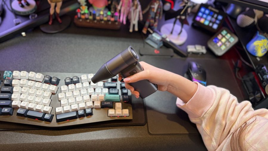 JisuLife Handheld Fan Ultra2 being used on a keyboard.