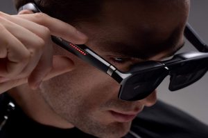 Man wearing ROG XREAL R1 AR Gaming Glasses.