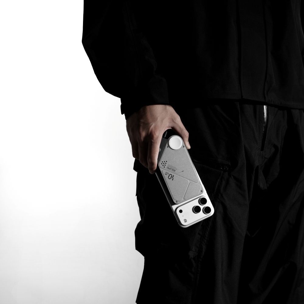 AULUMU M10 Multi-Charging Power Bank on phone being held by man